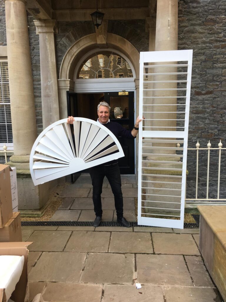 Duncan Holding Bespoke Window Shutters