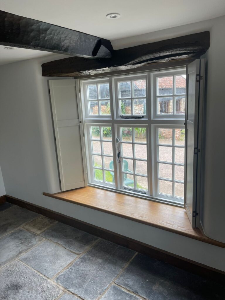 Bay window solid panel shutters
